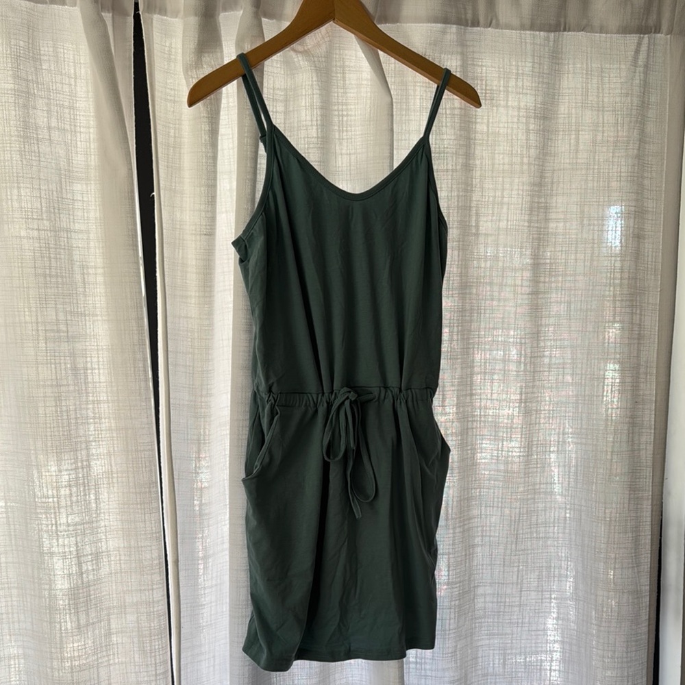 New with tags. Adorable summer dress or beach coverup.